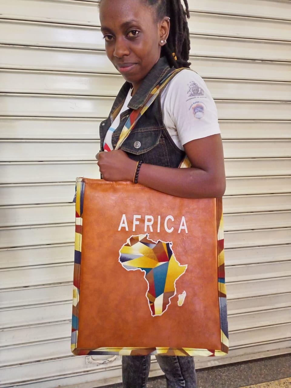 African Leather Tote bag, handcrafted laptop bag,Black woman modern African tote bag, Stylish tote bag, Brown girl bag, travel bag.