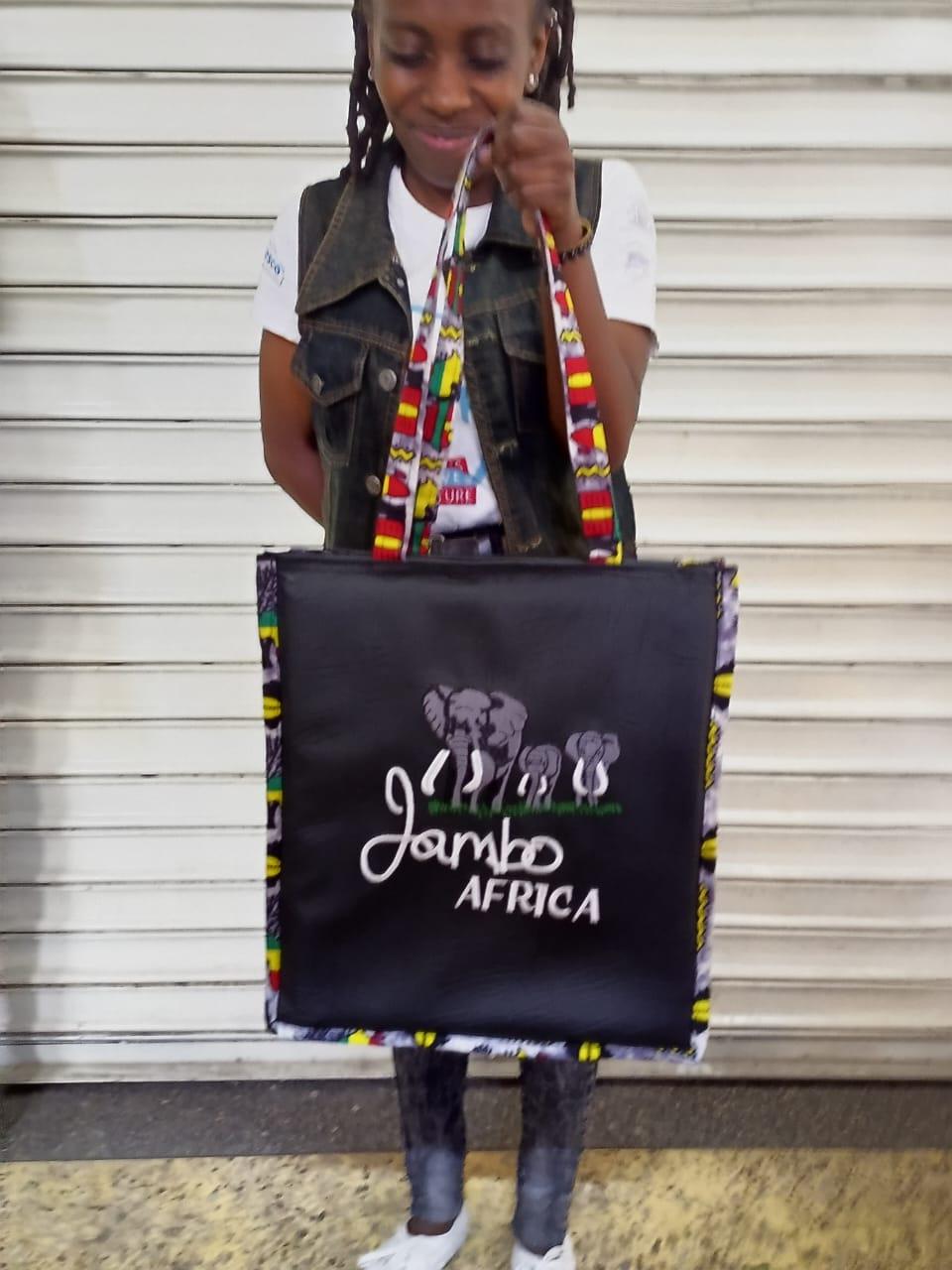 African Leather Tote bag, handcrafted laptop bag,Black woman modern African tote bag, Stylish tote bag, Brown girl bag, travel bag.
