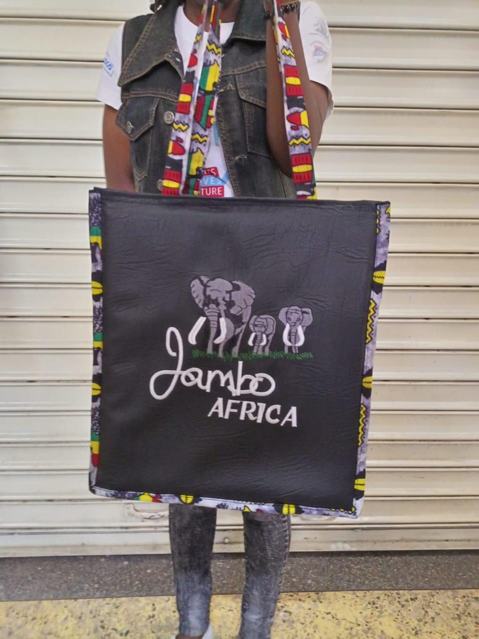 African Leather Tote bag, handcrafted laptop bag,Black woman modern African tote bag, Stylish tote bag, Brown girl bag, travel bag.