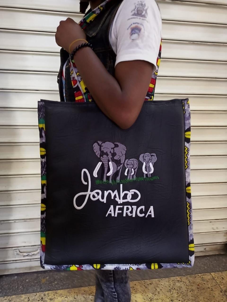 African Leather Tote bag, handcrafted laptop bag,Black woman modern African tote bag, Stylish tote bag, Brown girl bag, travel bag.