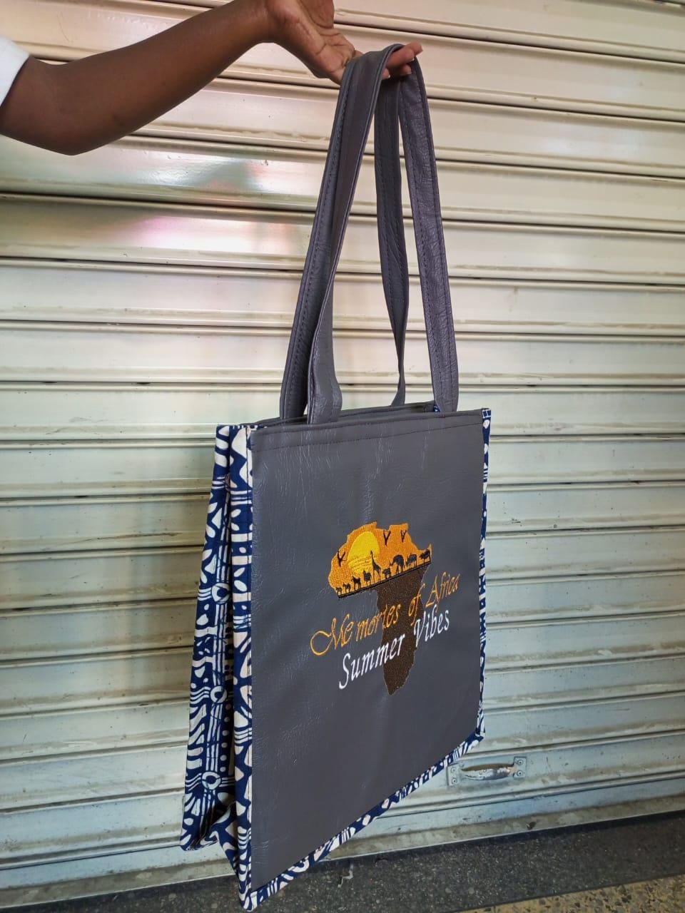 African Leather Tote bag, handcrafted laptop bag,Black woman modern African tote bag, Stylish tote bag, mother's day gifts, travel bag.