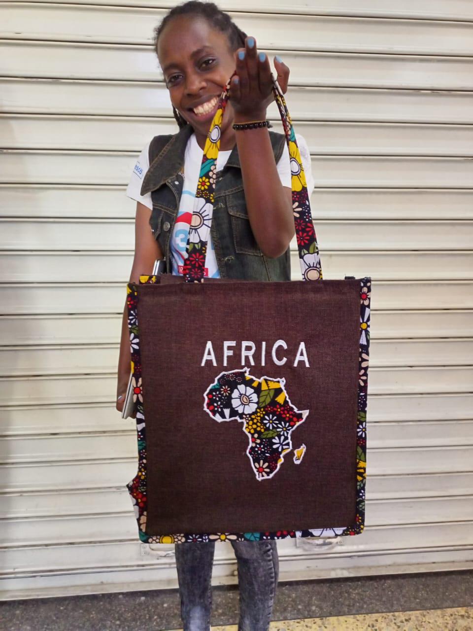 African Leather Tote bag, handcrafted laptop bag,Black woman modern African tote bag, Stylish tote bag, Brown girl bag, travel bag.