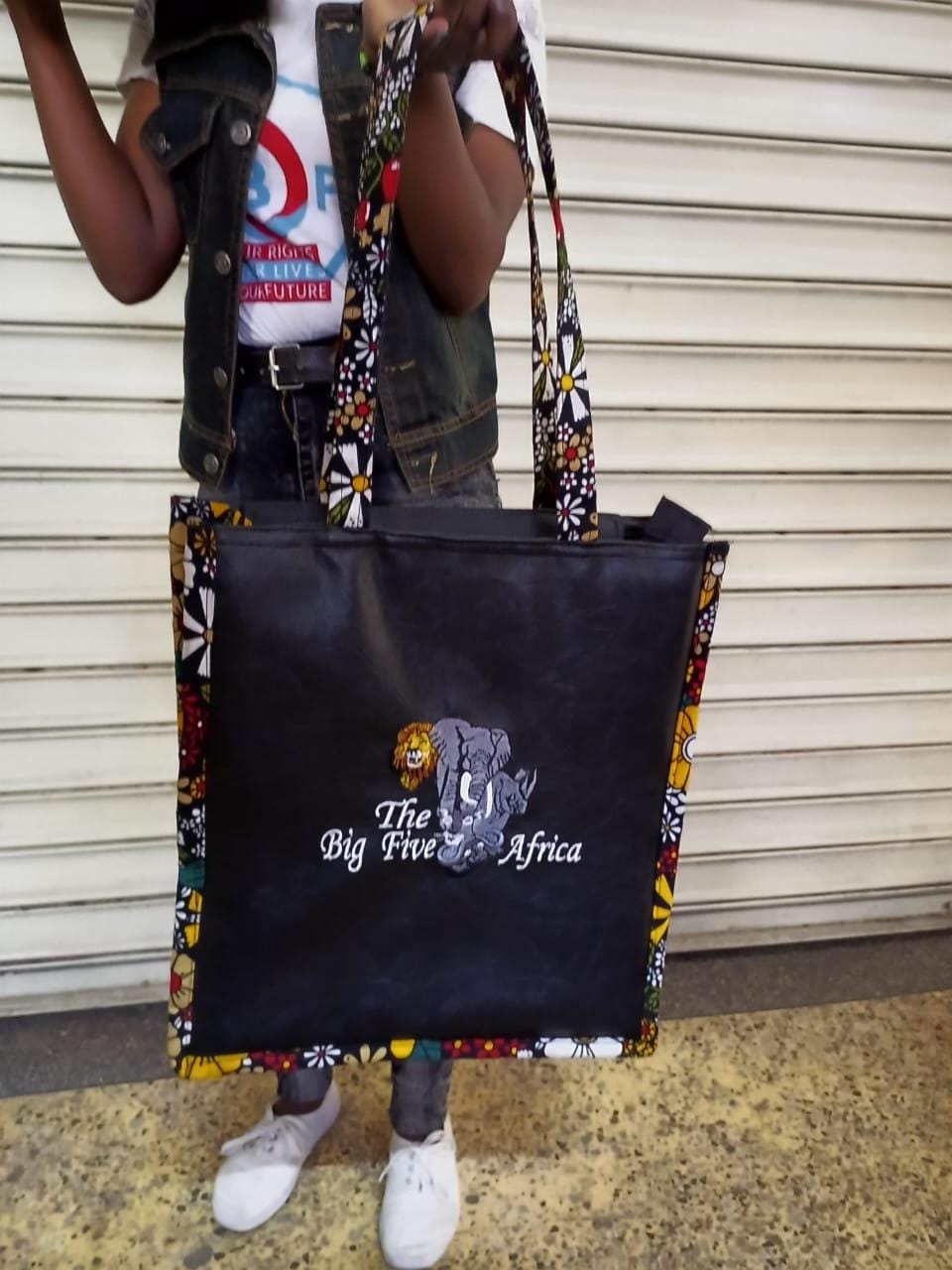 African Leather Tote bag, handcrafted laptop bag,Black woman modern African tote bag, Stylish tote bag, Brown girl bag, travel bag.