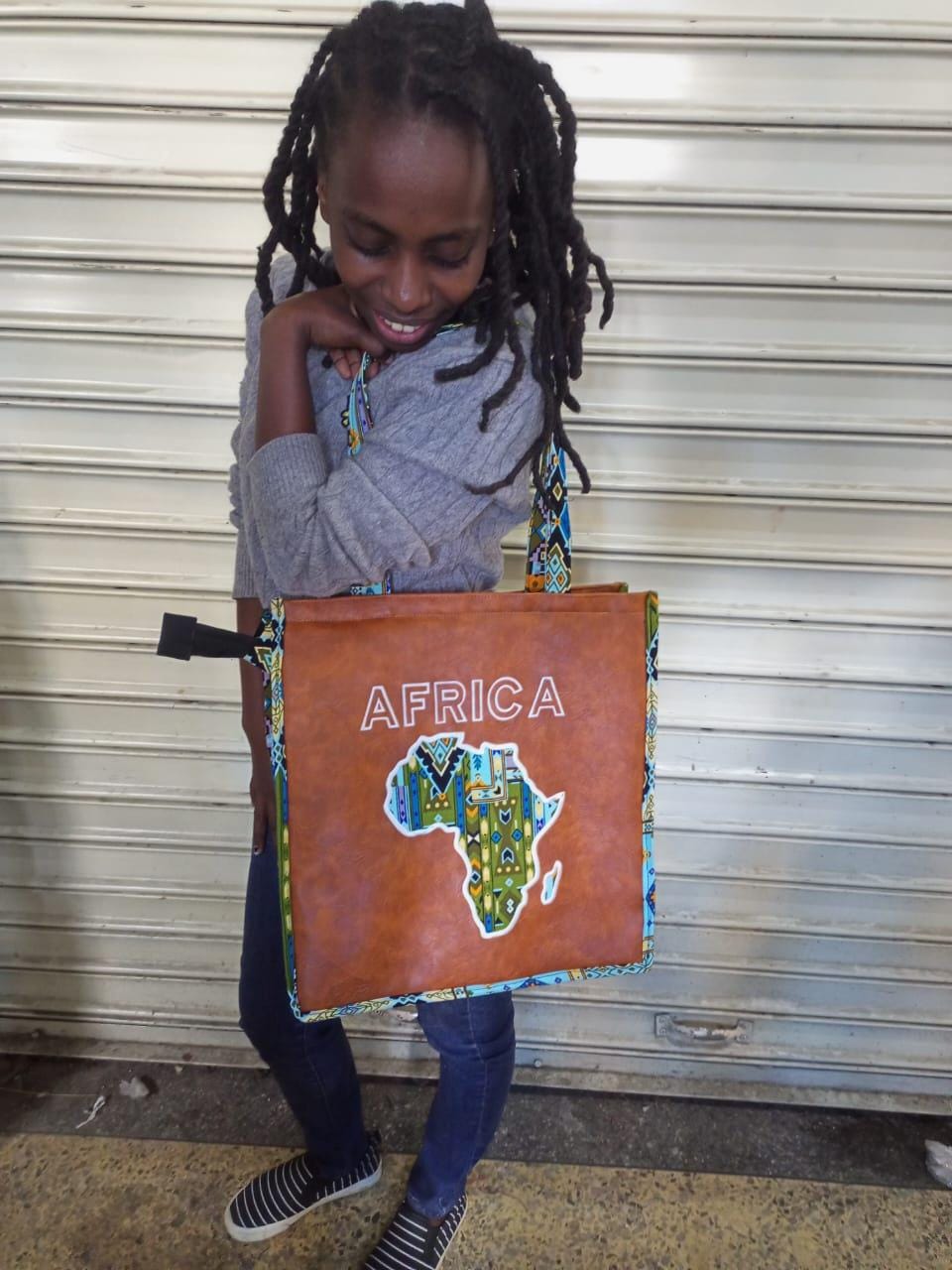 African Leather Tote bag, handcrafted laptop bag,Black woman modern African tote bag, Stylish tote bag, Brown girl bag, travel bag.