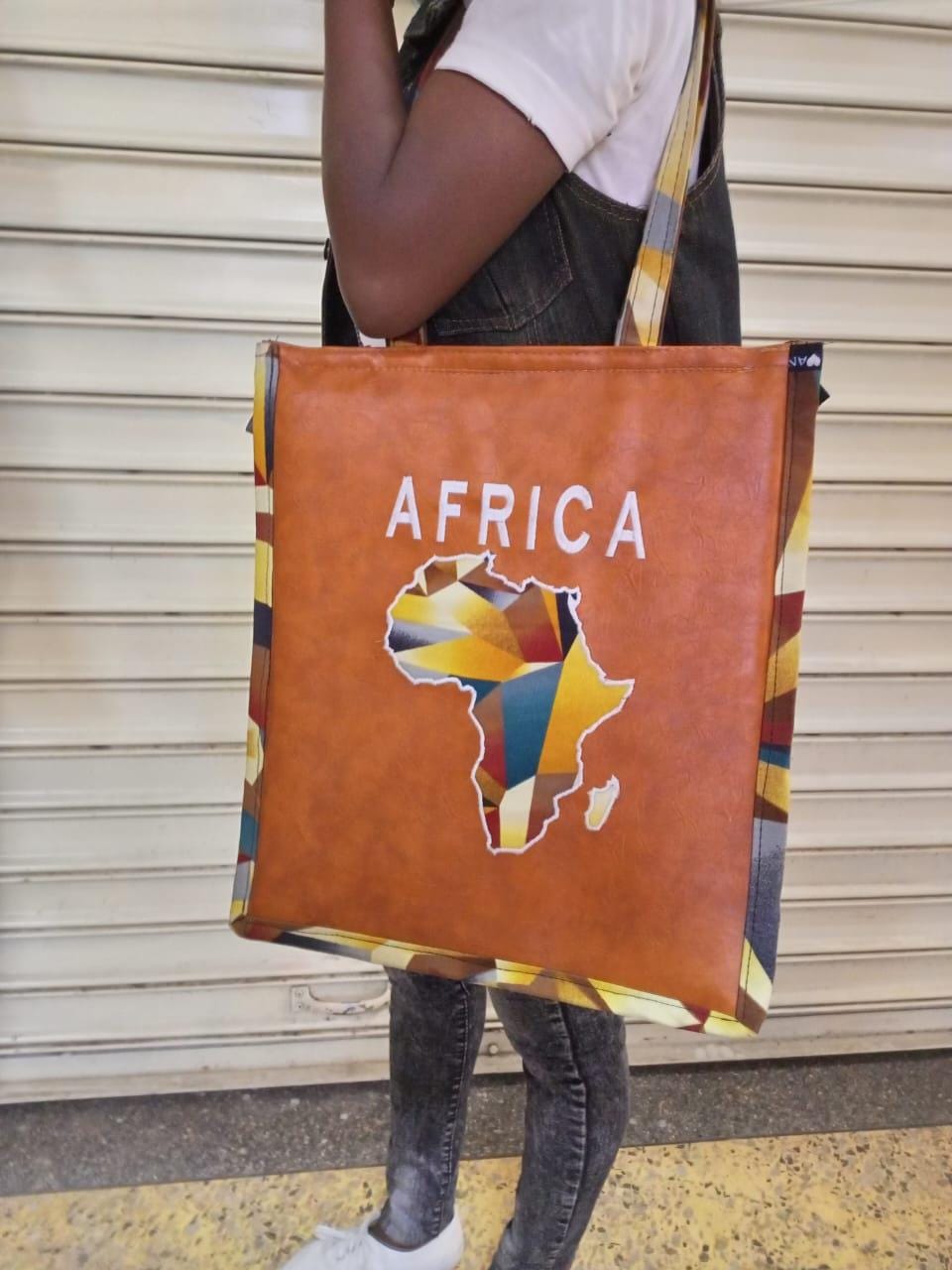 African Leather Tote bag, handcrafted laptop bag,Black woman modern African tote bag, Stylish tote bag, Brown girl bag, travel bag.