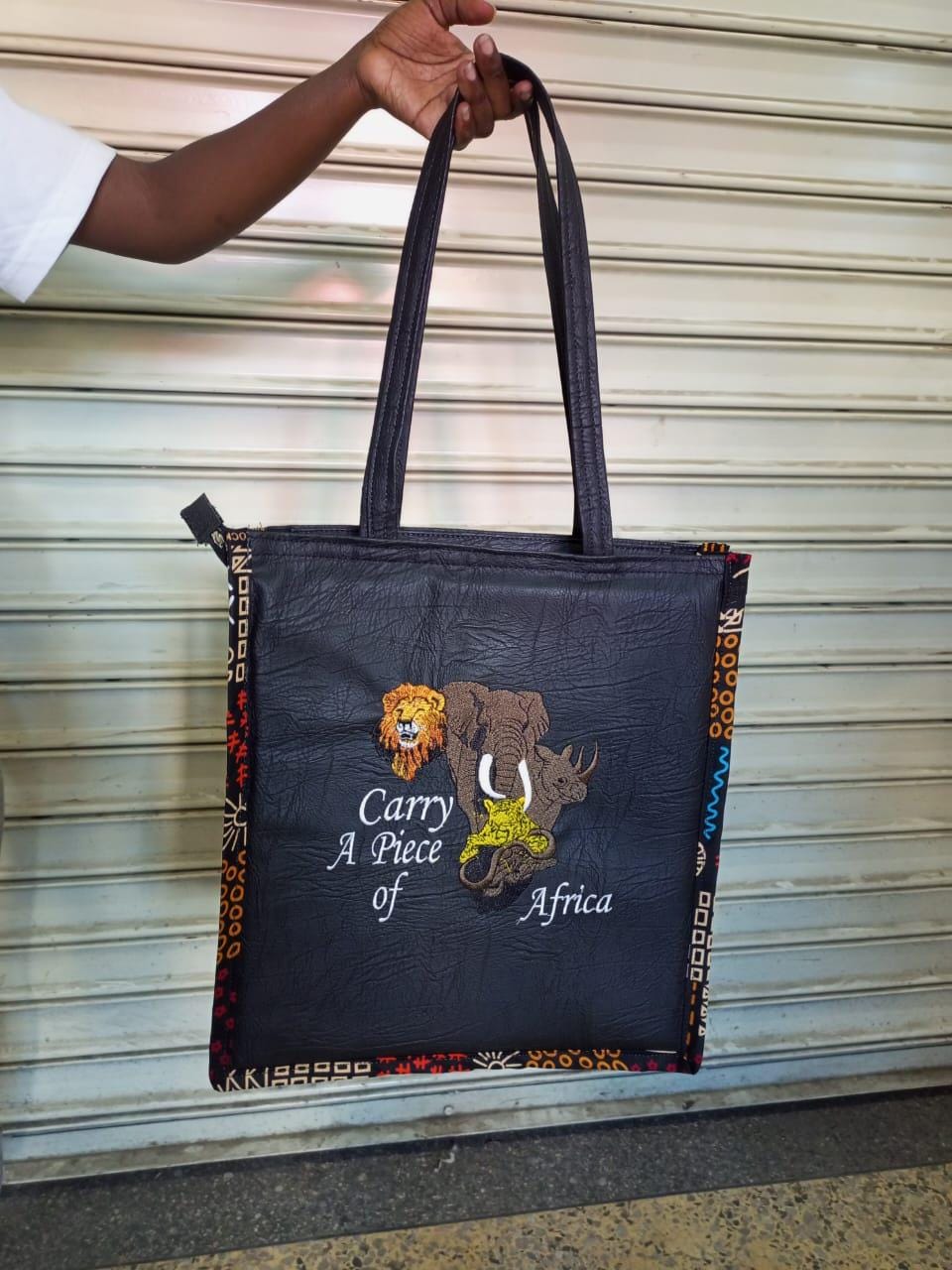 Carry a piece of Africa tote bag Leather Tote bag, handcrafted laptop bag,Black woman modern African tote bag,Stylish tote bag, mother's bag