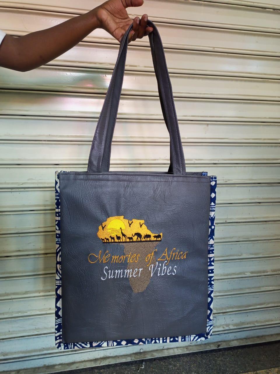 African Leather Tote bag, handcrafted laptop bag,Black woman modern African tote bag, Stylish tote bag, mother's day gifts, travel bag.