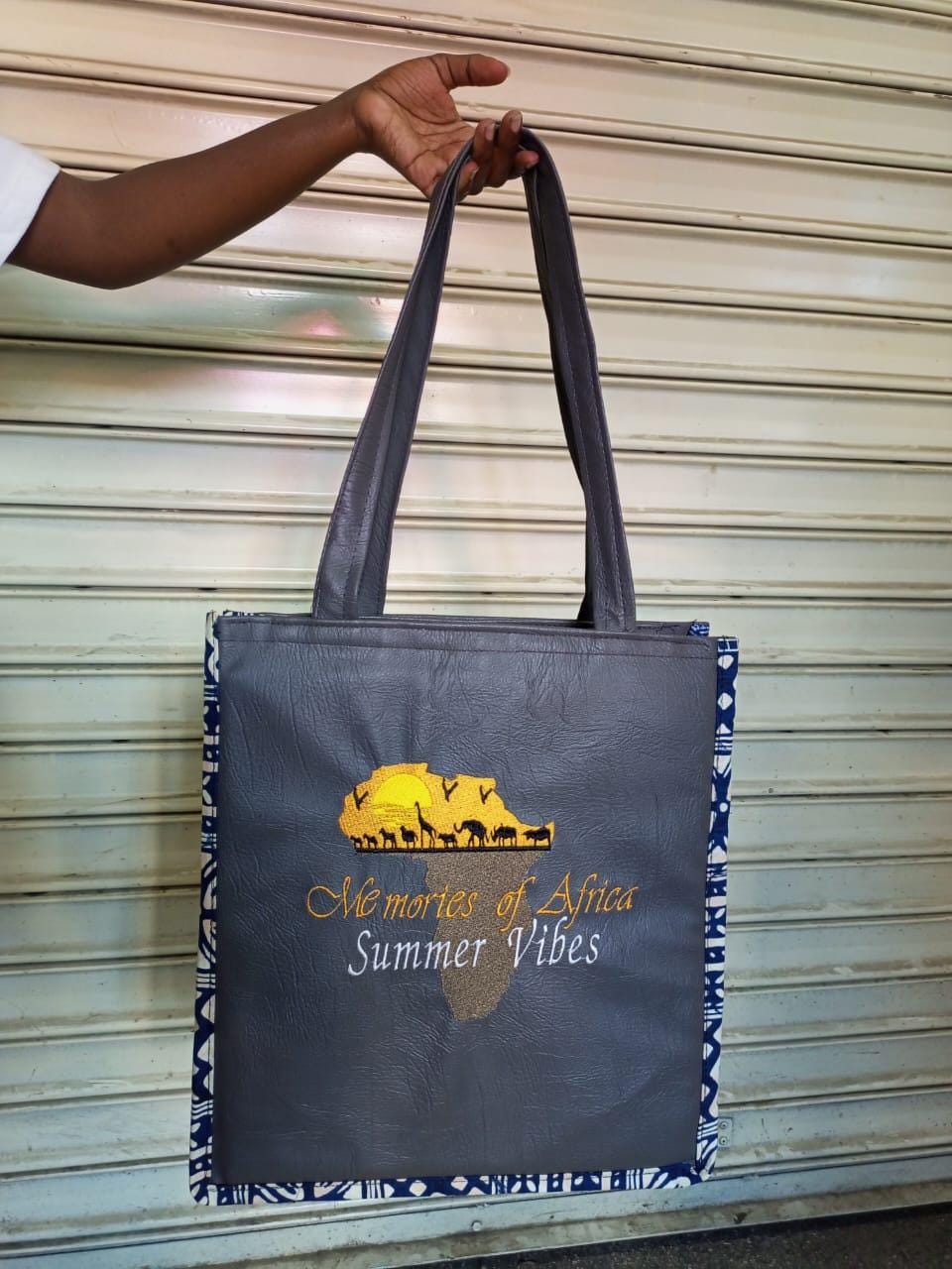 African Leather Tote bag, handcrafted laptop bag,Black woman modern African tote bag, Stylish tote bag, mother's day gifts, travel bag.