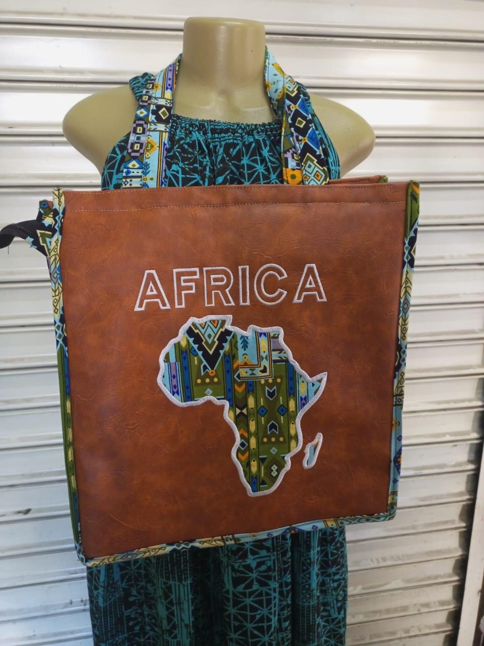 African Leather Tote bag, handcrafted laptop bag,Black woman modern African tote bag, Stylish tote bag, Brown girl bag, travel bag.