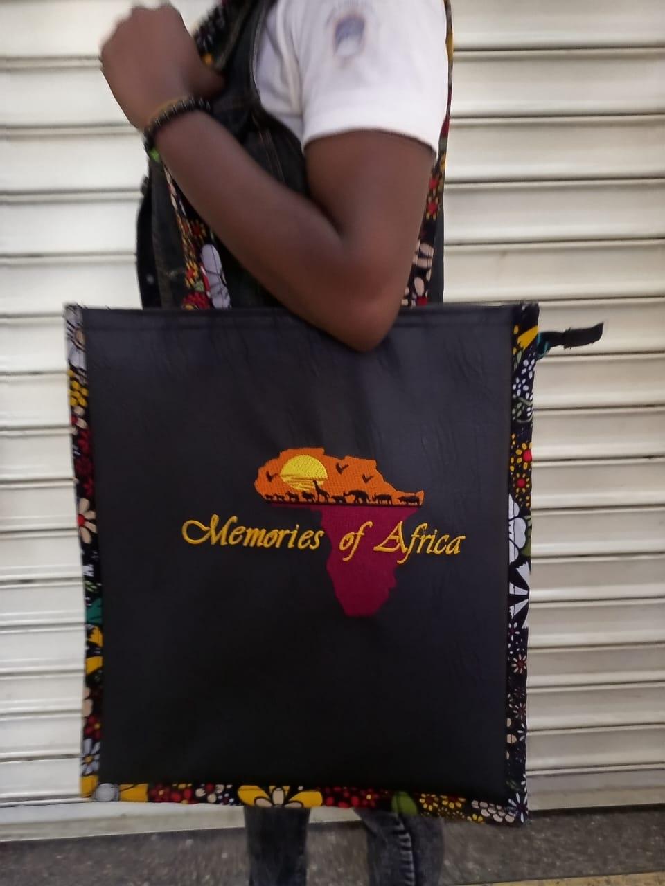 African Leather Tote bag, handcrafted laptop bag,Black woman modern African tote bag, Stylish tote bag, Brown girl bag, travel bag.