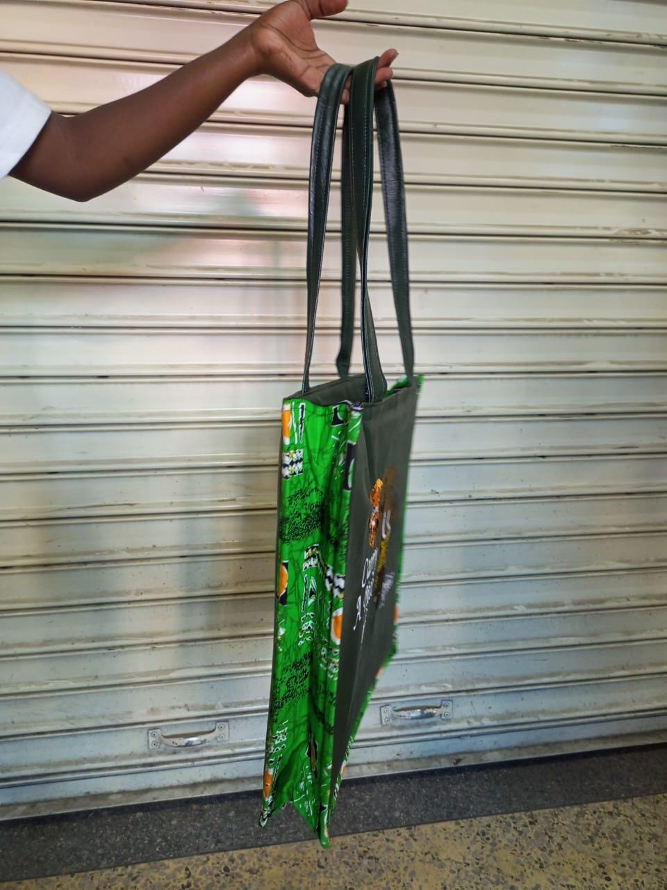Carry a piece of Africa tote bag Leather Tote bag, handcrafted laptop bag,Black woman modern African tote bag,Stylish tote bag, mother's bag