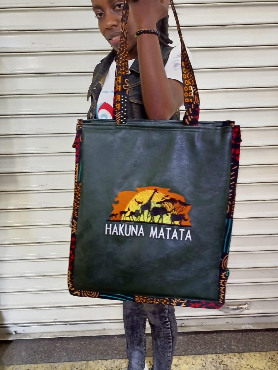 African Leather Tote bag, handcrafted laptop bag,Black woman modern African tote bag, Stylish tote bag, Brown girl bag, travel bag.