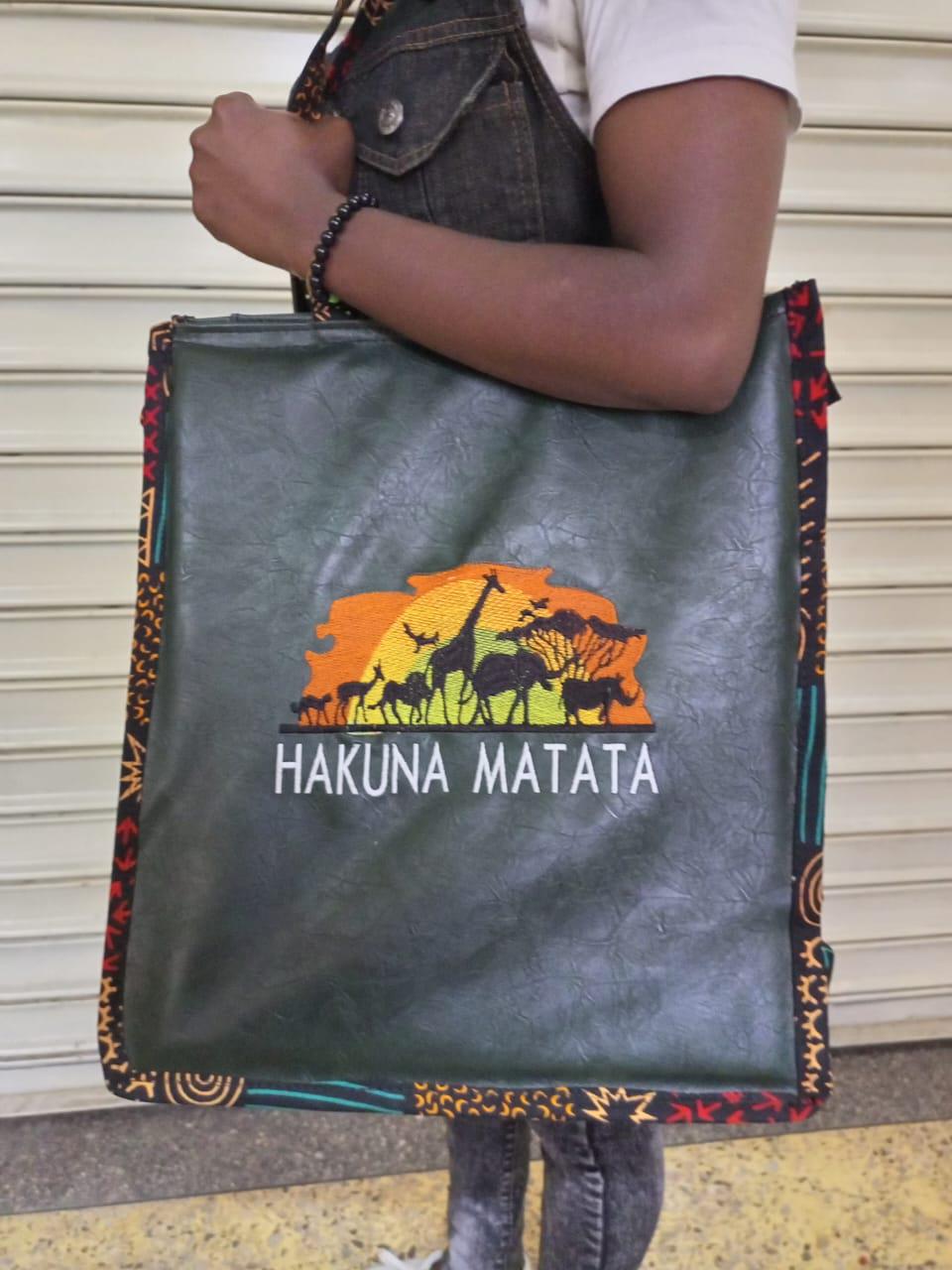African Leather Tote bag, handcrafted laptop bag,Black woman modern African tote bag, Stylish tote bag, Brown girl bag, travel bag.