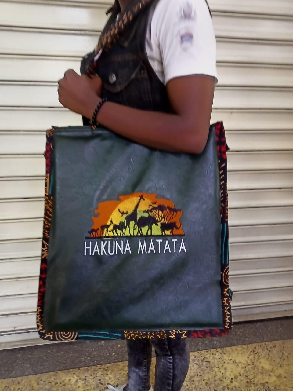 African Leather Tote bag, handcrafted laptop bag,Black woman modern African tote bag, Stylish tote bag, Brown girl bag, travel bag.