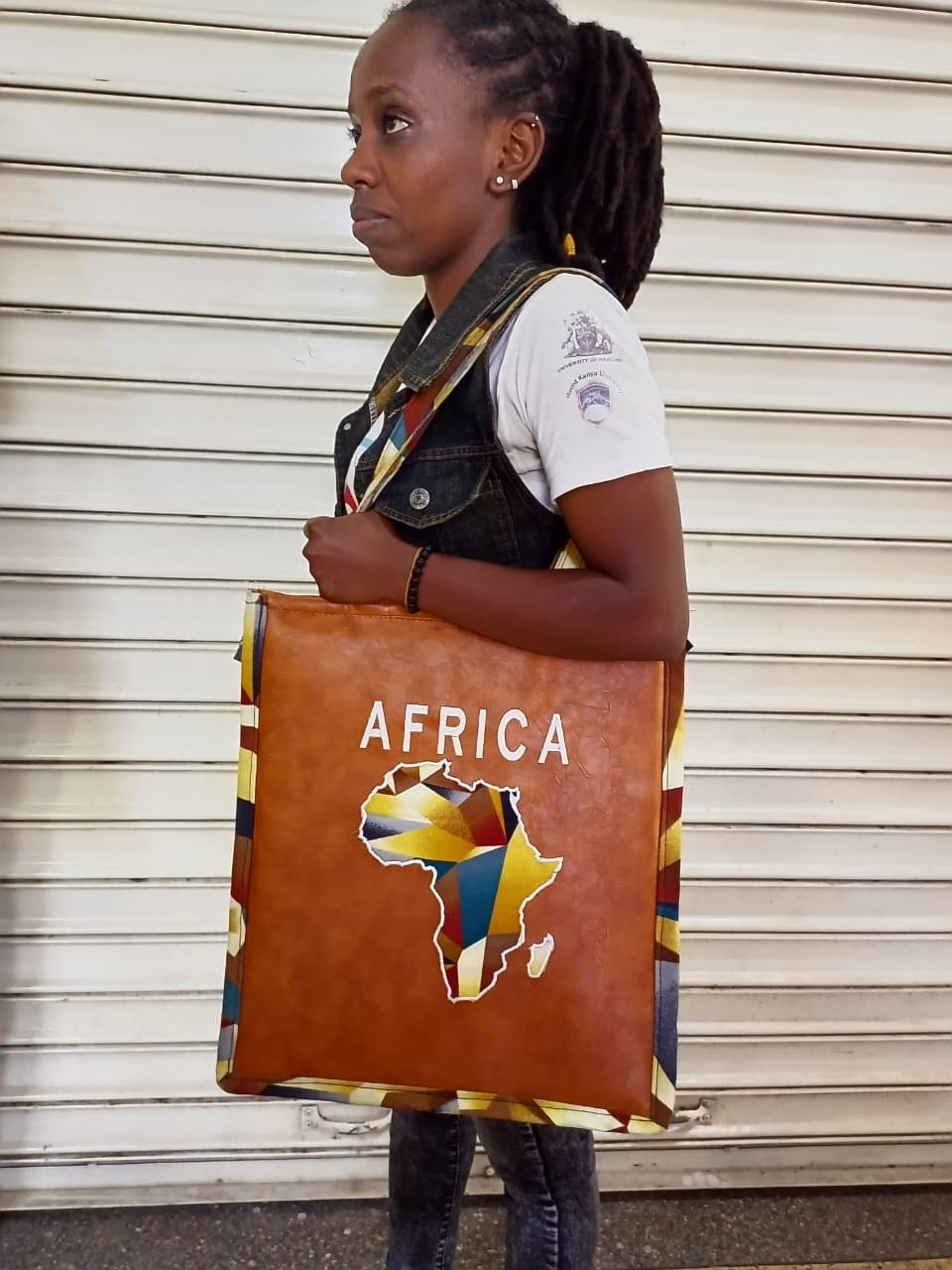 African Leather Tote bag, handcrafted laptop bag,Black woman modern African tote bag, Stylish tote bag, Brown girl bag, travel bag.