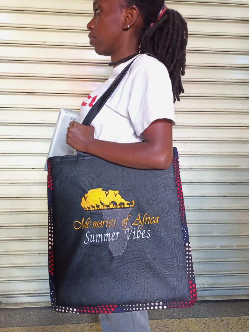 African Leather Tote bag, handcrafted laptop bag,Black woman modern African tote bag, Stylish tote bag, mother's day gifts, travel bag.