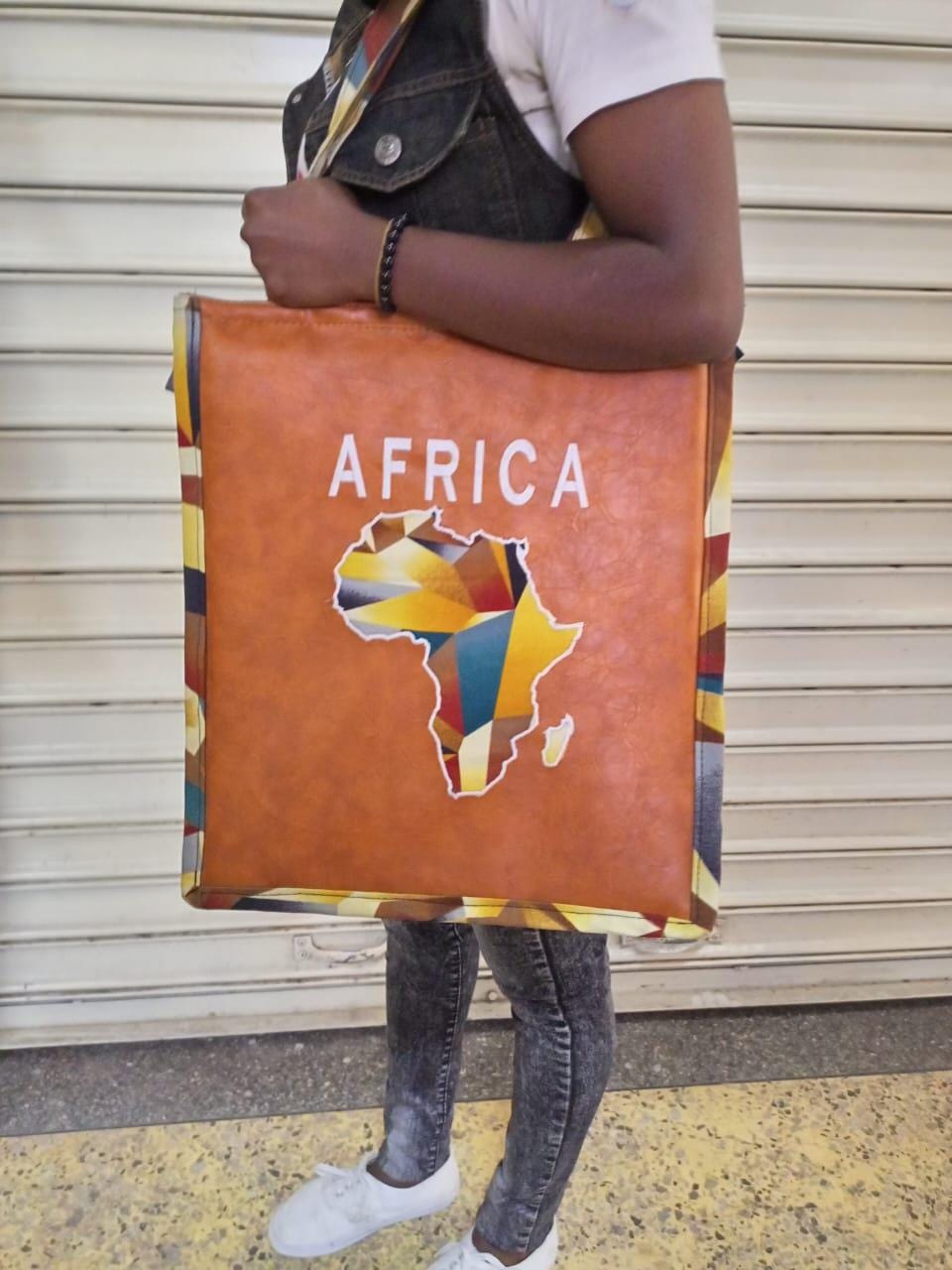 African Leather Tote bag, handcrafted laptop bag,Black woman modern African tote bag, Stylish tote bag, Brown girl bag, travel bag.