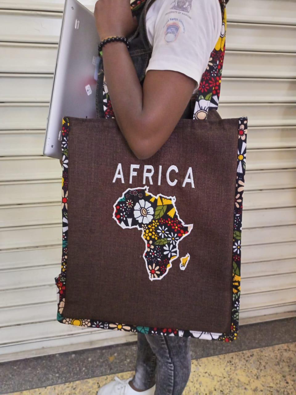 African Leather Tote bag, handcrafted laptop bag,Black woman modern African tote bag, Stylish tote bag, Brown girl bag, travel bag.