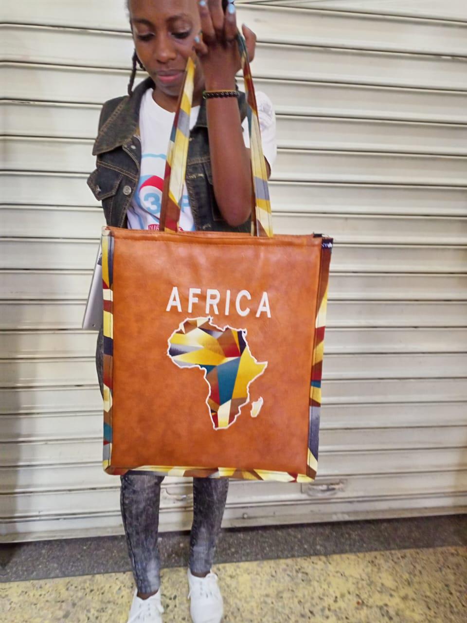 African Leather Tote bag, handcrafted laptop bag,Black woman modern African tote bag, Stylish tote bag, Brown girl bag, travel bag.