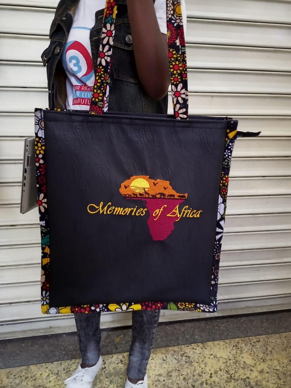 African Leather Tote bag, handcrafted laptop bag,Black woman modern African tote bag, Stylish tote bag, Brown girl bag, travel bag.