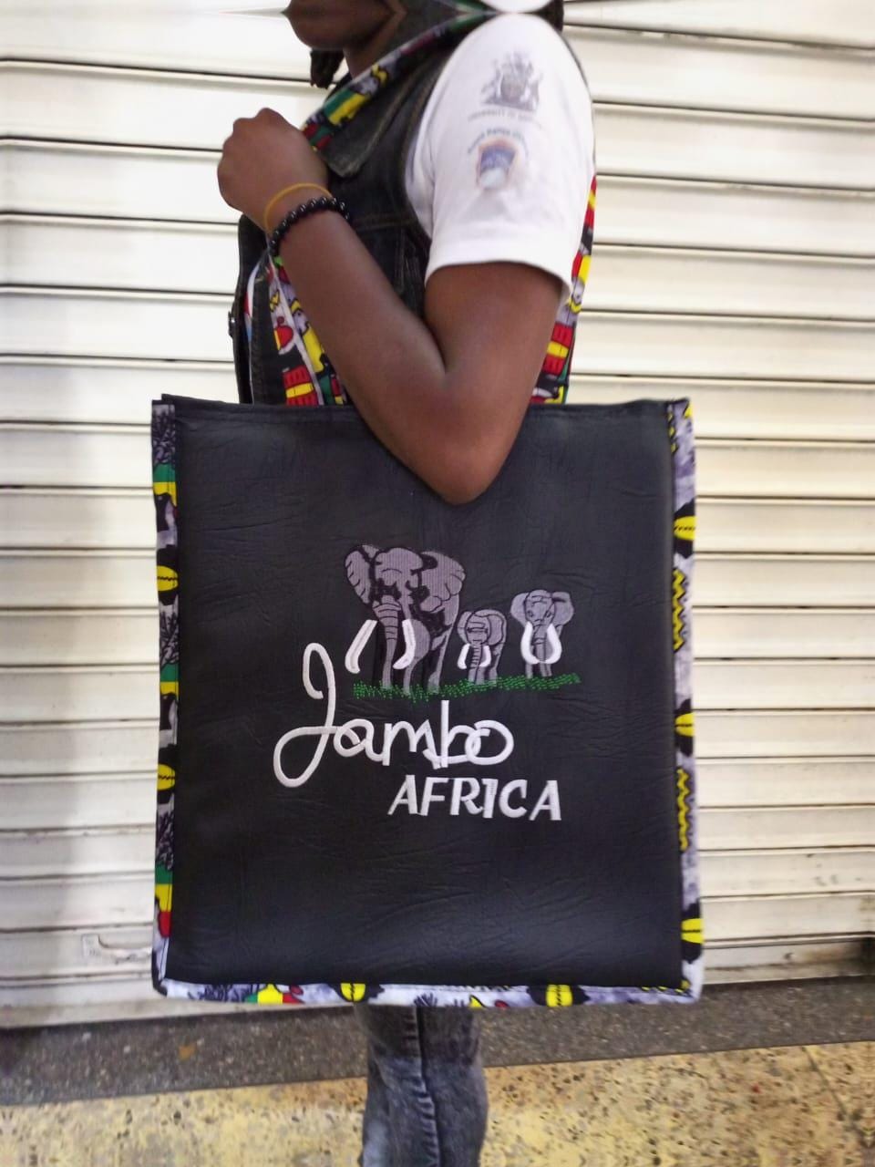 African Leather Tote bag, handcrafted laptop bag,Black woman modern African tote bag, Stylish tote bag, Brown girl bag, travel bag.