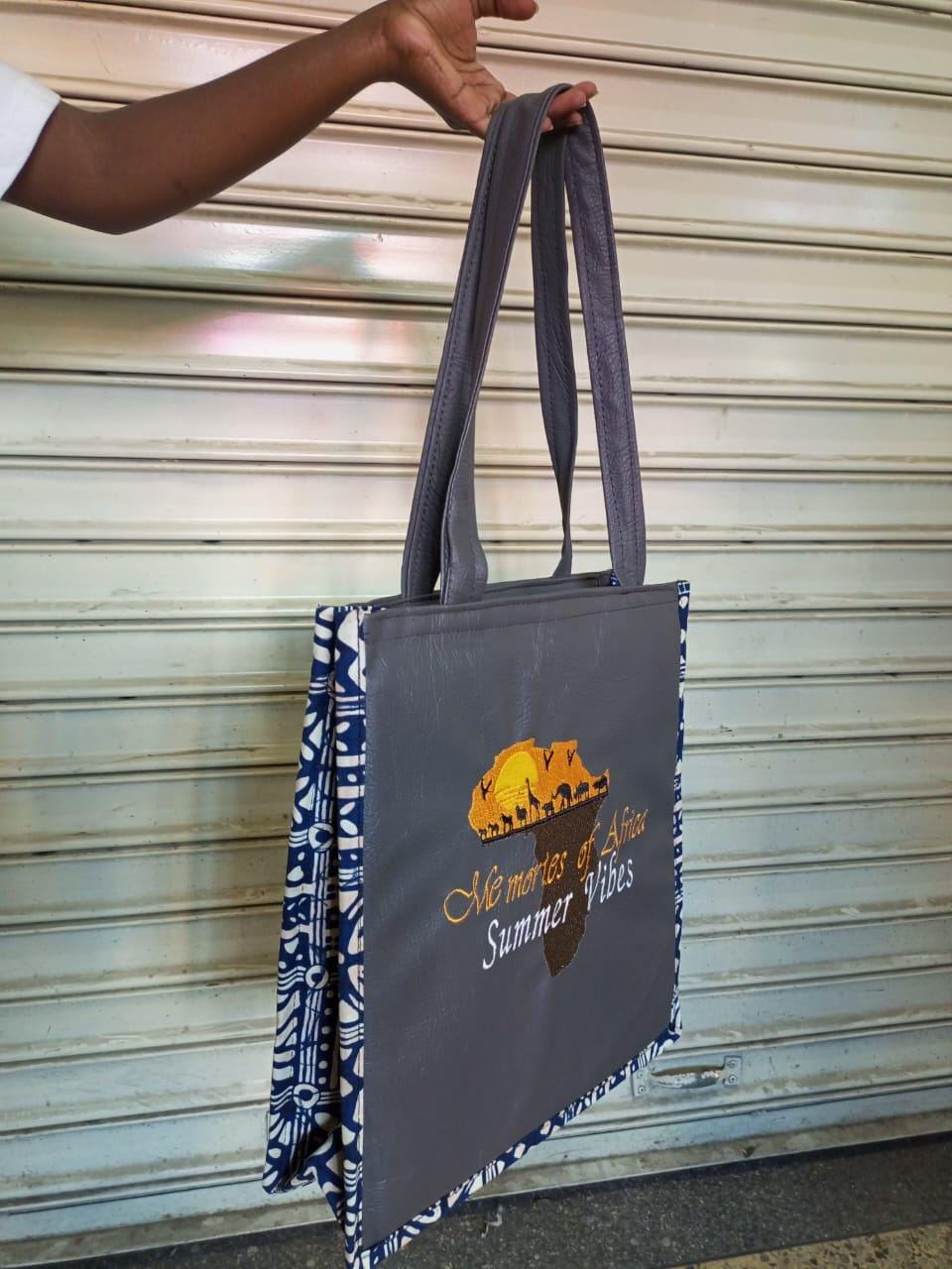 African Leather Tote bag, handcrafted laptop bag,Black woman modern African tote bag, Stylish tote bag, mother's day gifts, travel bag.