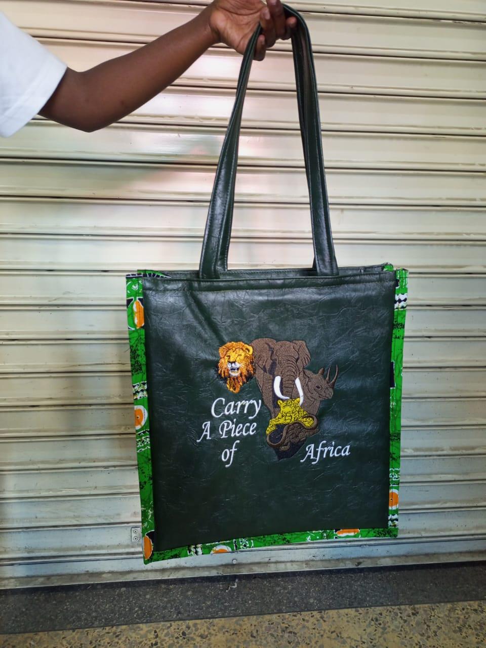 Carry a piece of Africa tote bag Leather Tote bag, handcrafted laptop bag,Black woman modern African tote bag,Stylish tote bag, mother's bag