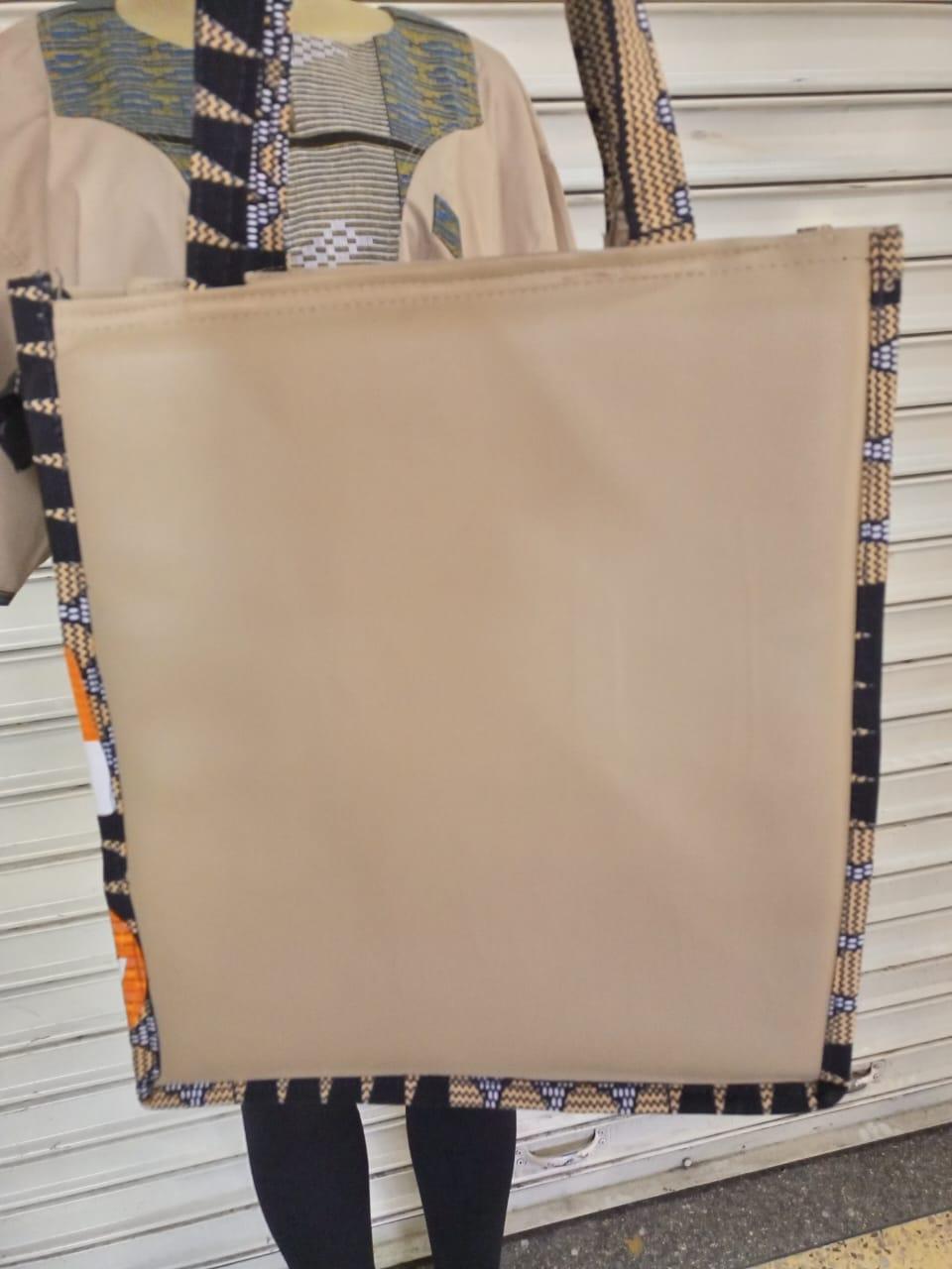 African Leather Tote bag, handcrafted laptop bag,Black woman modern African tote bag, Stylish tote bag, Brown girl bag, travel bag.