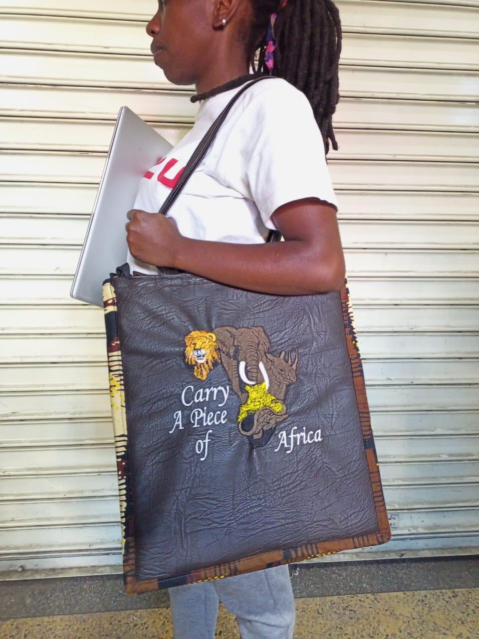 Carry a piece of Africa Tote bag, handcrafted laptop bag,Black woman modern African tote bag, Stylish tote bag, Mother's day gifts.