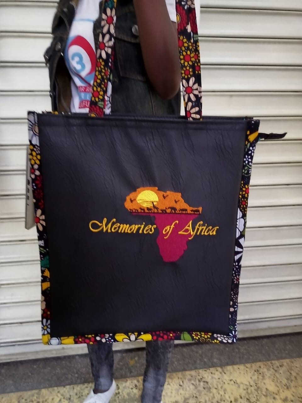 African Leather Tote bag, handcrafted laptop bag,Black woman modern African tote bag, Stylish tote bag, Brown girl bag, travel bag.