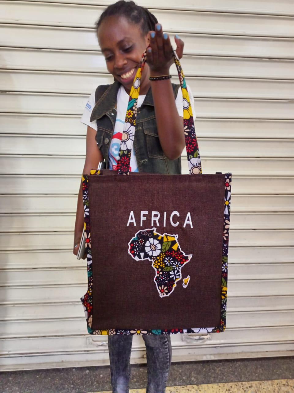 African Leather Tote bag, handcrafted laptop bag,Black woman modern African tote bag, Stylish tote bag, Brown girl bag, travel bag.