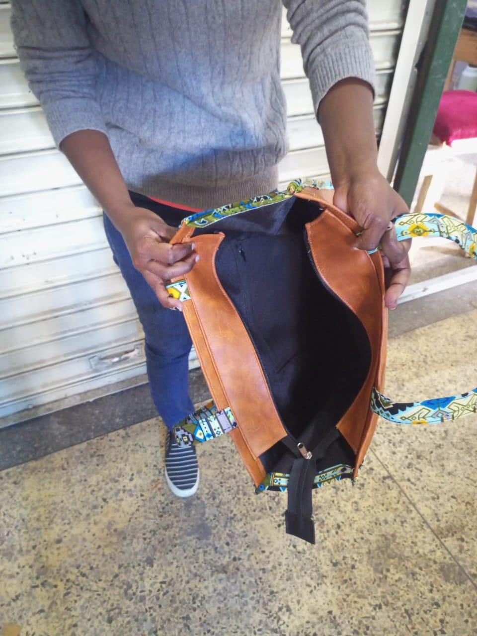 African Leather Tote bag, handcrafted laptop bag,Black woman modern African tote bag, Stylish tote bag, Brown girl bag, travel bag.