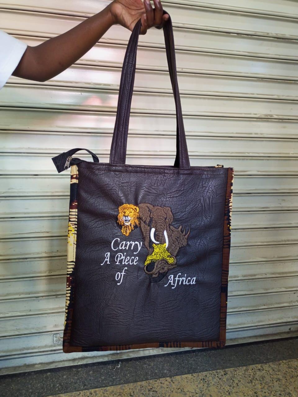 Carry a piece of Africa Tote bag, handcrafted laptop bag,Black woman modern African tote bag, Stylish tote bag, Mother's day gifts.