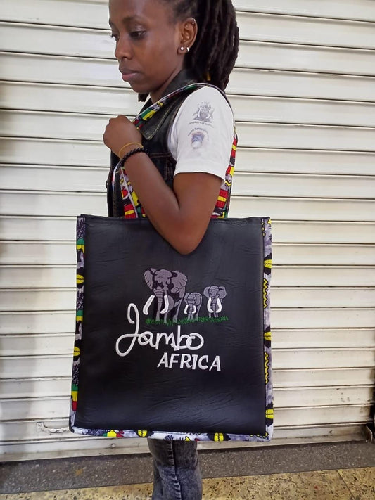 African Leather Tote bag, handcrafted laptop bag,Black woman modern African tote bag, Stylish tote bag, Brown girl bag, travel bag.