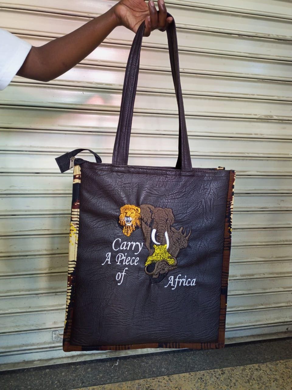 Carry a piece of Africa Tote bag, handcrafted laptop bag,Black woman modern African tote bag, Stylish tote bag, Mother's day gifts.