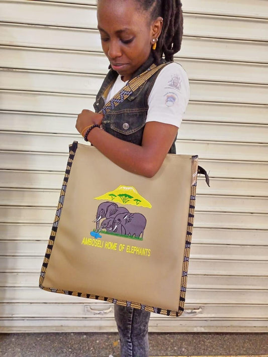 African Leather Tote bag, handcrafted laptop bag,Black woman modern African tote bag, Stylish tote bag, Brown girl bag, travel bag.