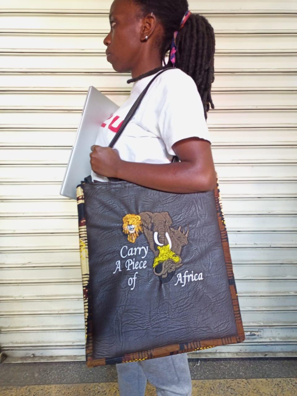 Carry a piece of Africa Tote bag, handcrafted laptop bag,Black woman modern African tote bag, Stylish tote bag, Mother's day gifts.