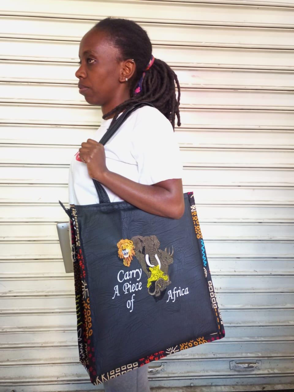 Carry a piece of Africa tote bag Leather Tote bag, handcrafted laptop bag,Black woman modern African tote bag,Stylish tote bag, mother's bag