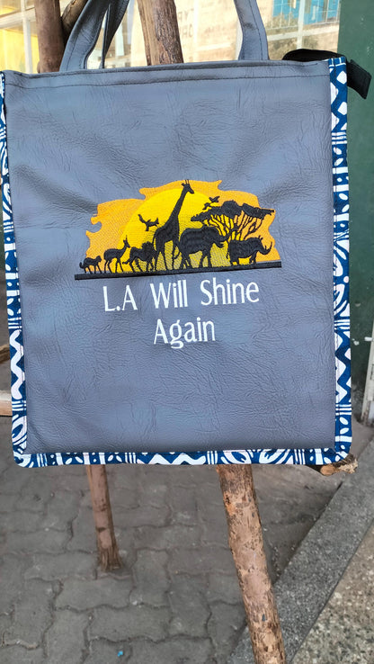 L A will Shine again African Leather Tote bag, handcrafted laptop bag,Black woman modern African tote bag, Stylish tote bag, Brown girl bag.