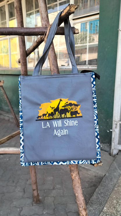 L A will Shine again African Leather Tote bag, handcrafted laptop bag,Black woman modern African tote bag, Stylish tote bag, Brown girl bag.