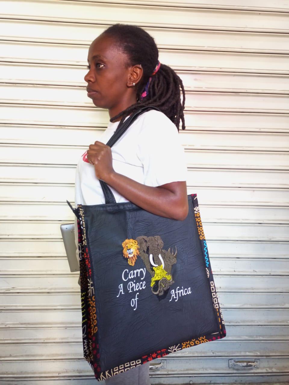 Carry a piece of Africa tote bag Leather Tote bag, handcrafted laptop bag,Black woman modern African tote bag,Stylish tote bag, mother's bag