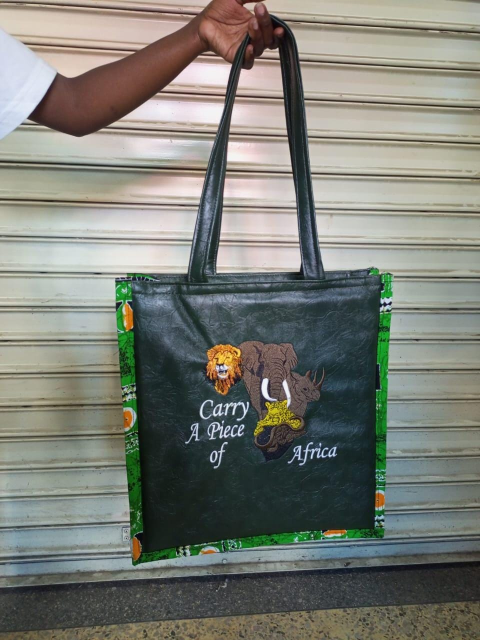Carry a piece of Africa tote bag Leather Tote bag, handcrafted laptop bag,Black woman modern African tote bag,Stylish tote bag, mother's bag