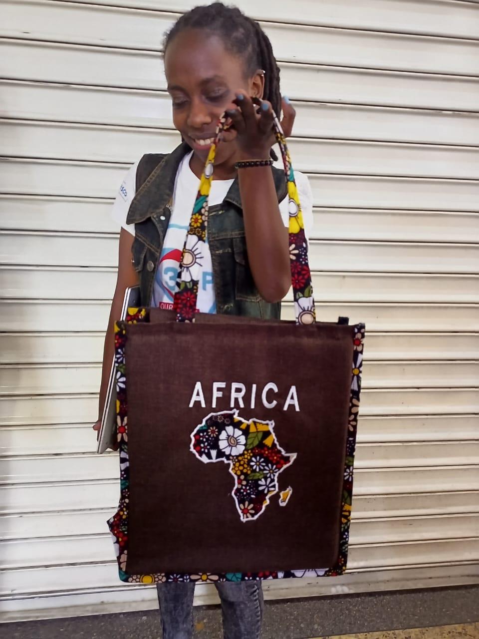 African Leather Tote bag, handcrafted laptop bag,Black woman modern African tote bag, Stylish tote bag, Brown girl bag, travel bag.