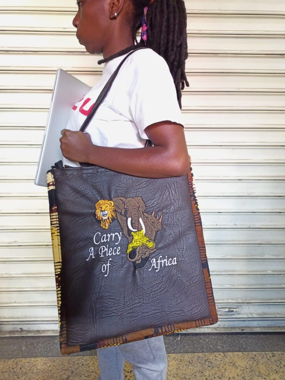 Carry a piece of Africa Tote bag, handcrafted laptop bag,Black woman modern African tote bag, Stylish tote bag, Mother's day gifts.
