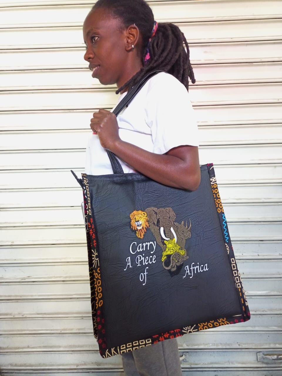 Carry a piece of Africa tote bag Leather Tote bag, handcrafted laptop bag,Black woman modern African tote bag,Stylish tote bag, mother's bag