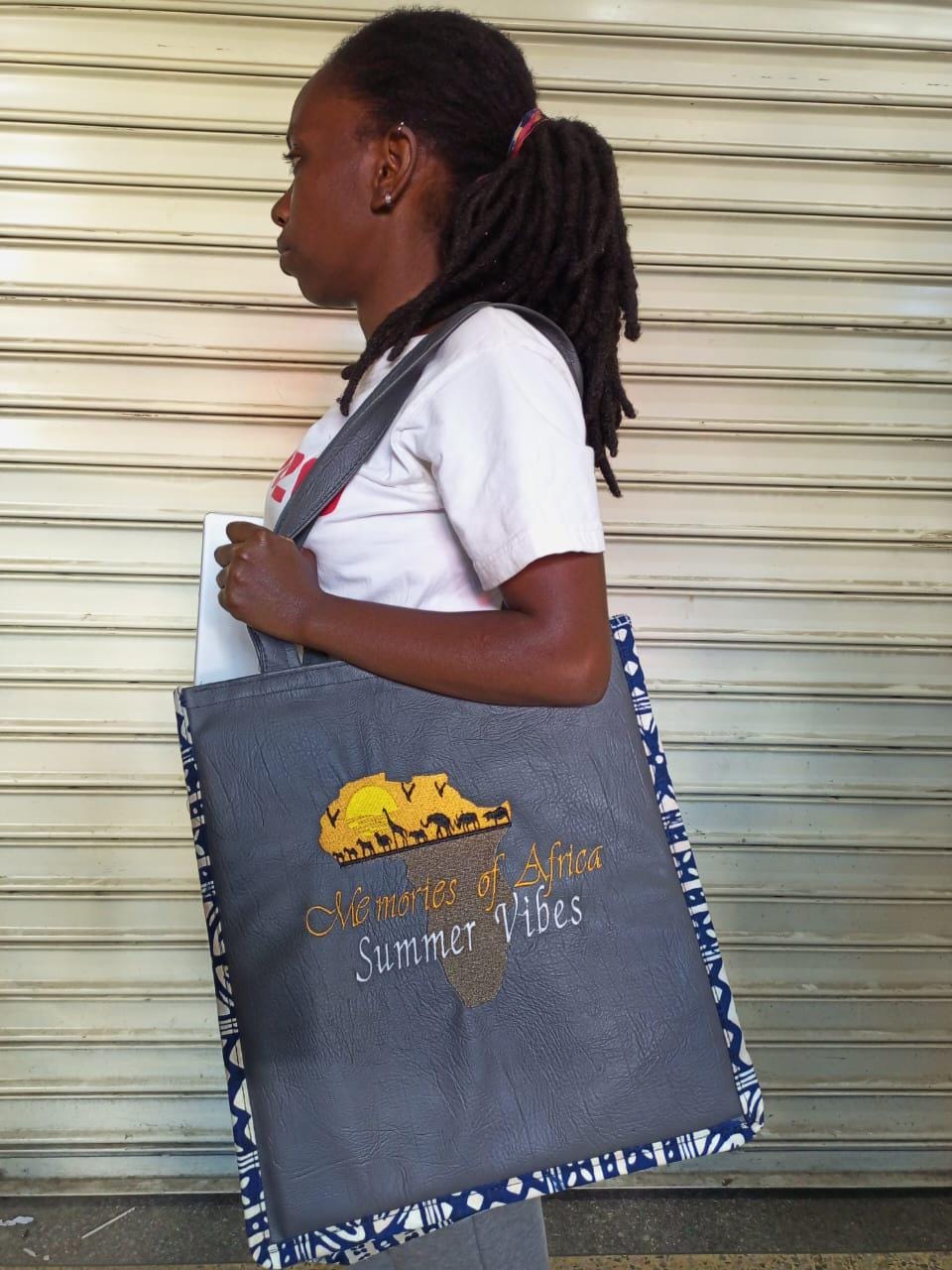 African Leather Tote bag, handcrafted laptop bag,Black woman modern African tote bag, Stylish tote bag, mother's day gifts, travel bag.