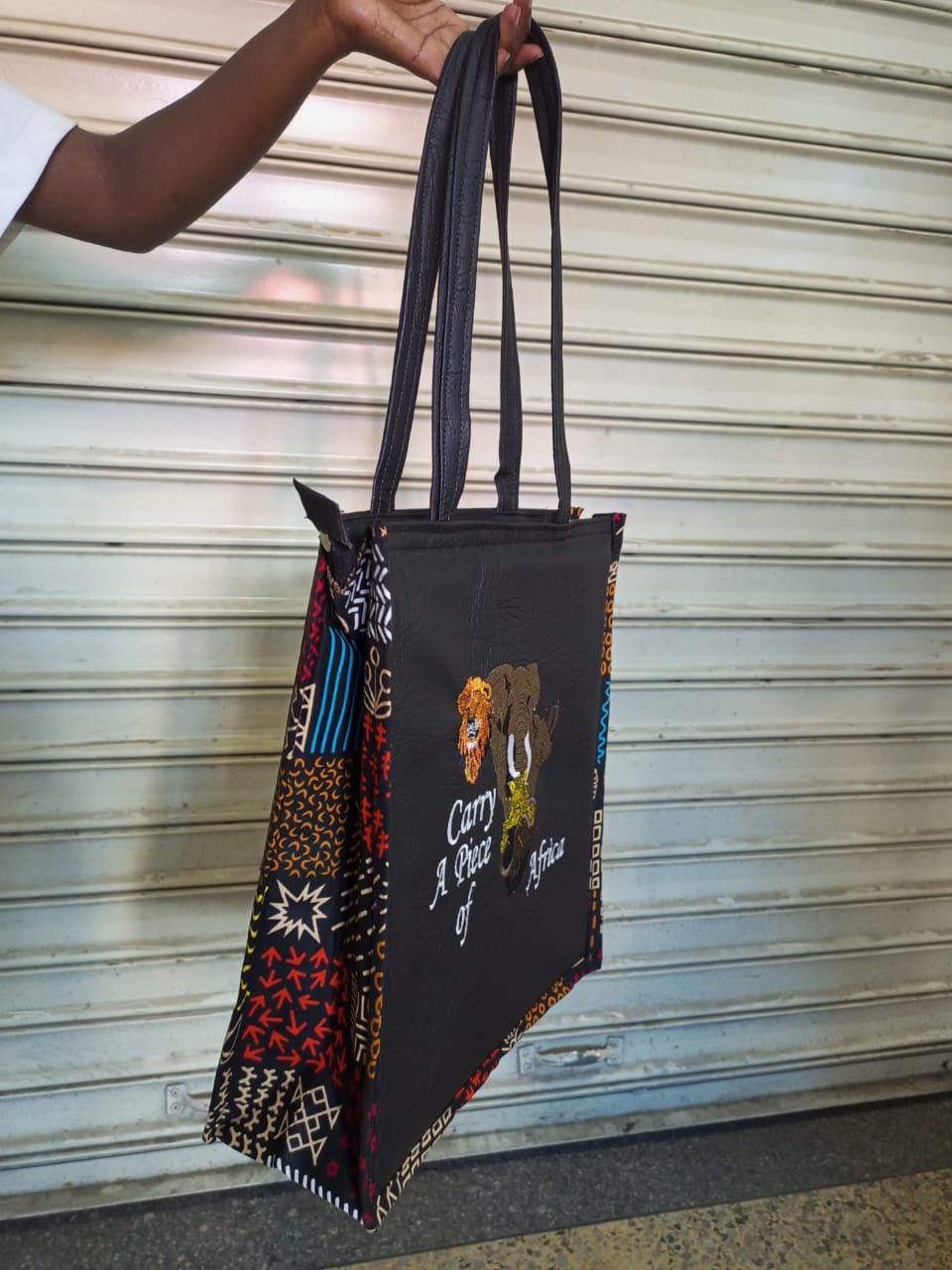 Carry a piece of Africa tote bag Leather Tote bag, handcrafted laptop bag,Black woman modern African tote bag,Stylish tote bag, mother's bag