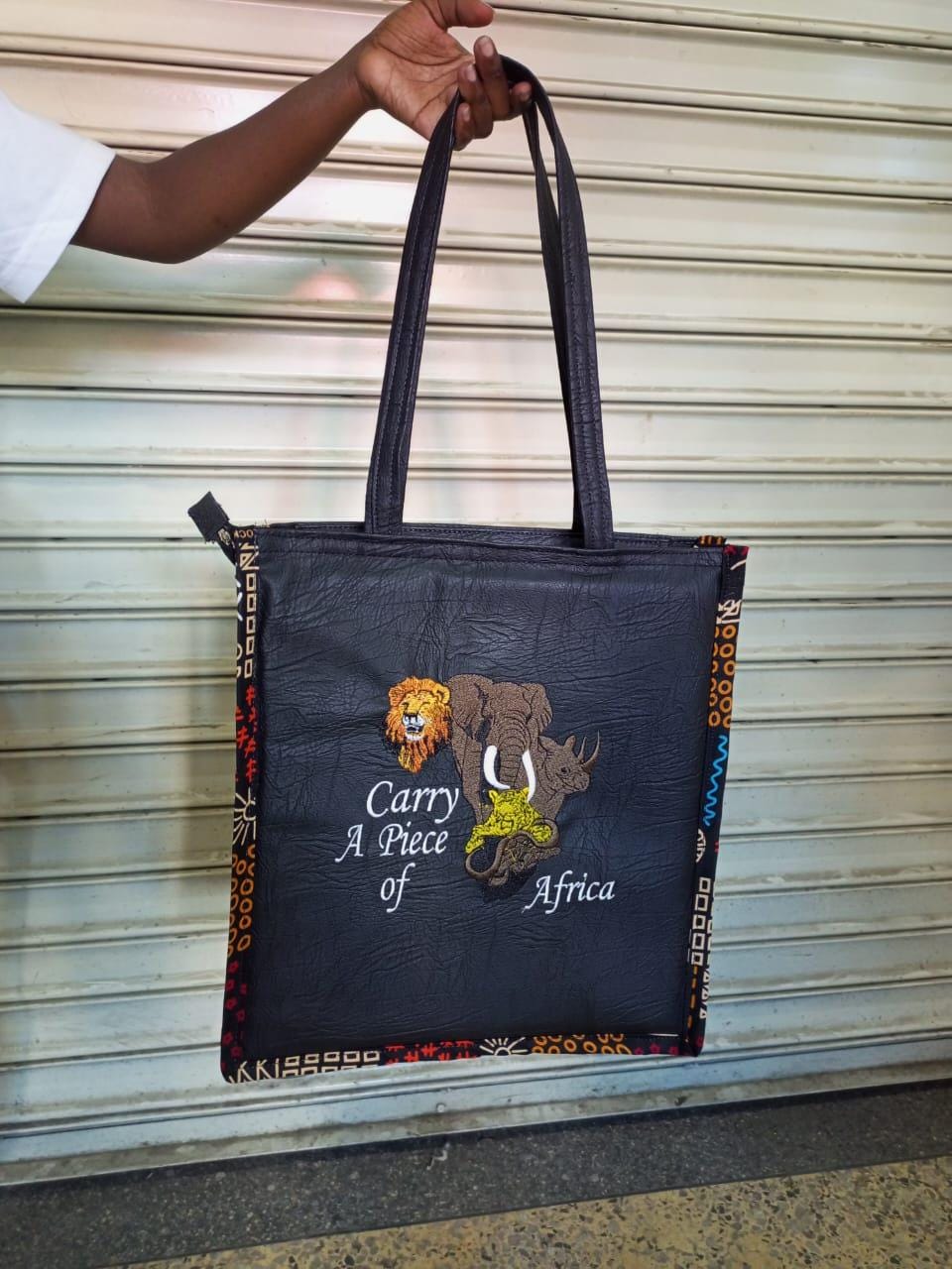 Carry a piece of Africa tote bag Leather Tote bag, handcrafted laptop bag,Black woman modern African tote bag,Stylish tote bag, mother's bag