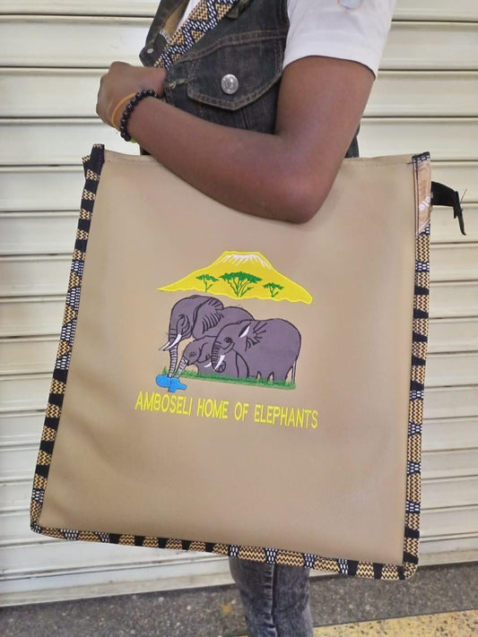 African Leather Tote bag, handcrafted laptop bag,Black woman modern African tote bag, Stylish tote bag, Brown girl bag, travel bag.