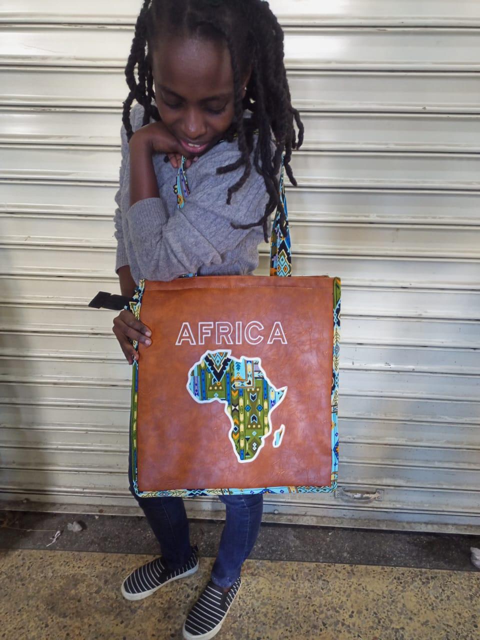 African Leather Tote bag, handcrafted laptop bag,Black woman modern African tote bag, Stylish tote bag, Brown girl bag, travel bag.